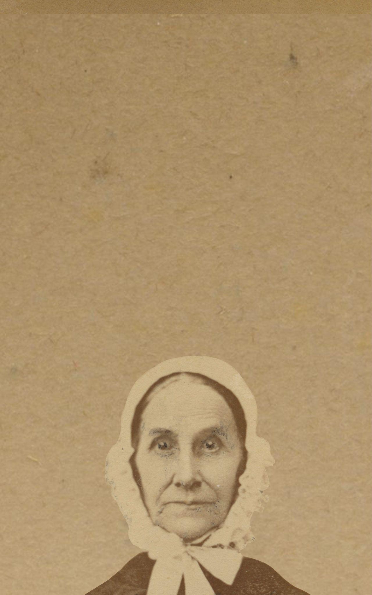 A cropped version of the bonnet-wearing woman, showing a smaller portion of her shoulders and her head, with ample extra space at the top of the photo.