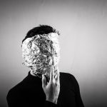 person wearing a tin foil mask