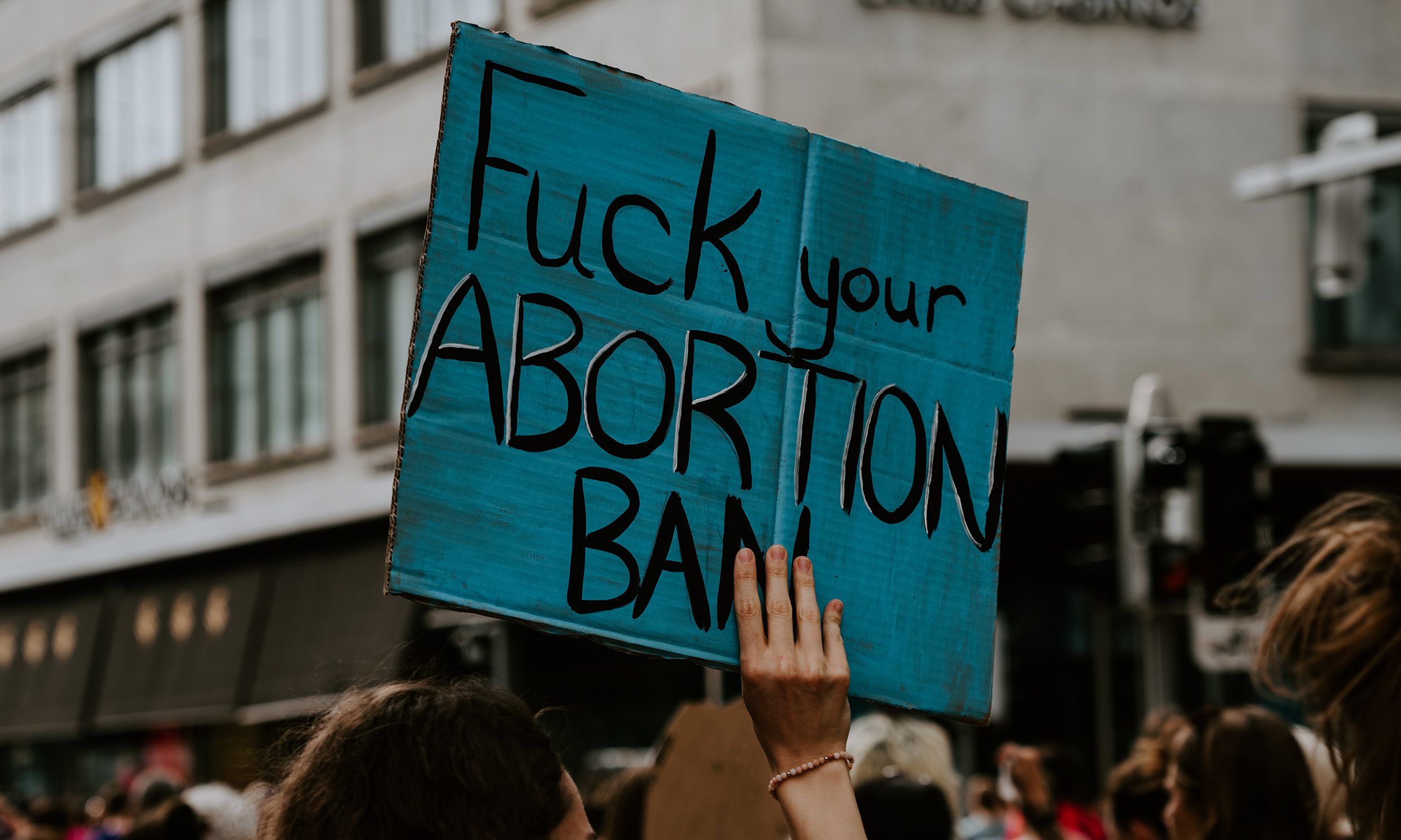 Activists protest the ban on abortion