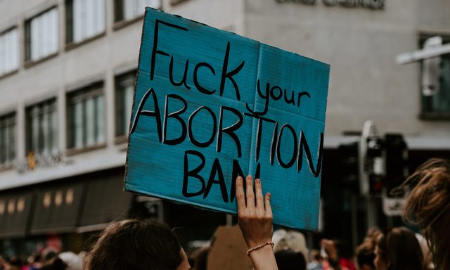 Activists protest the ban on abortion