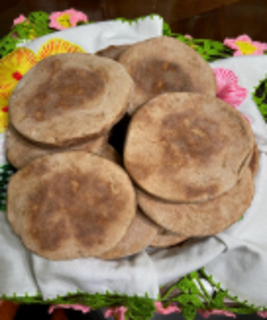 Gorditas piled high on a plate